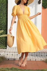 Vestido midi amarillo de manga corta y corte A